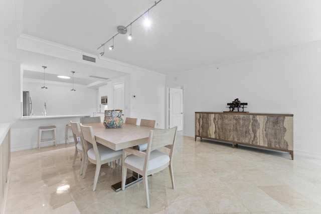 550 SE Mizner Blvd Unit B206, Boca Raton, FL 33432 - dining room with crown molding and baseboards