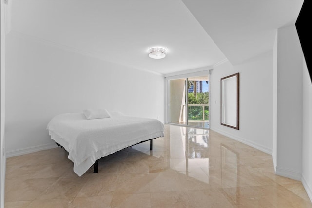 550 SE Mizner Blvd Unit B206, Boca Raton, FL 33432 - bedroom featuring ornamental molding and baseboards