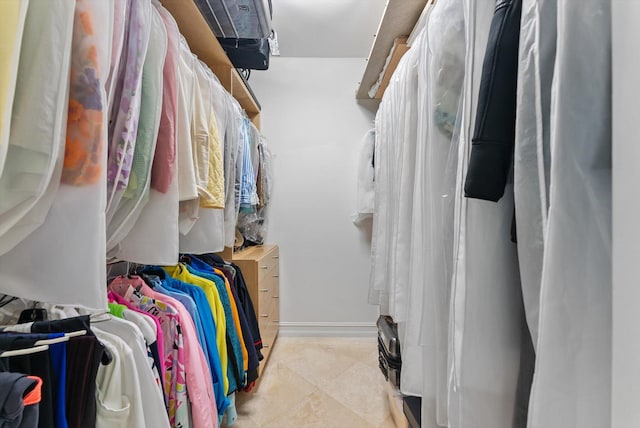 550 SE Mizner Blvd Unit B206, Boca Raton, FL 33432 - spacious closet featuring light tile patterned floors