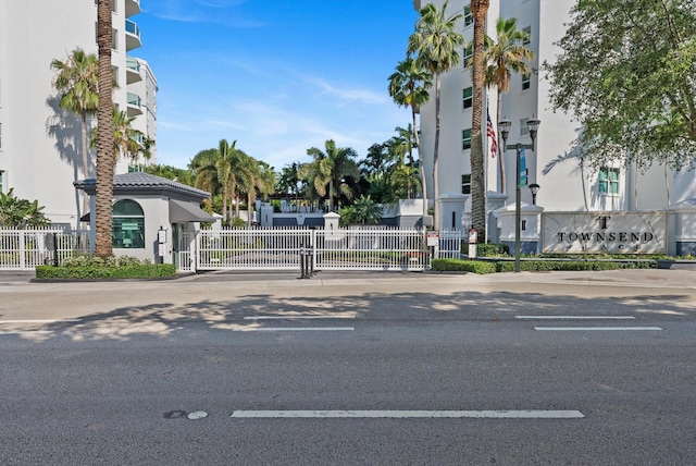 550 SE Mizner Blvd Unit B206, Boca Raton, FL 33432 - view of asphalt road featuring a gate and a gated entry