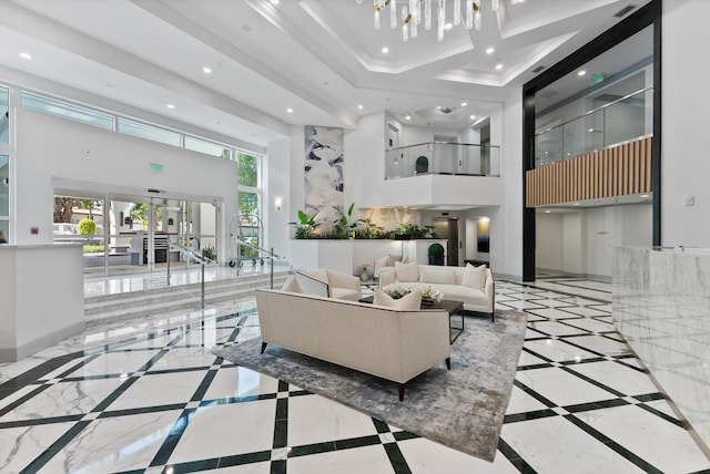 550 SE Mizner Blvd Unit B206, Boca Raton, FL 33432 - lobby featuring a towering ceiling and recessed lighting