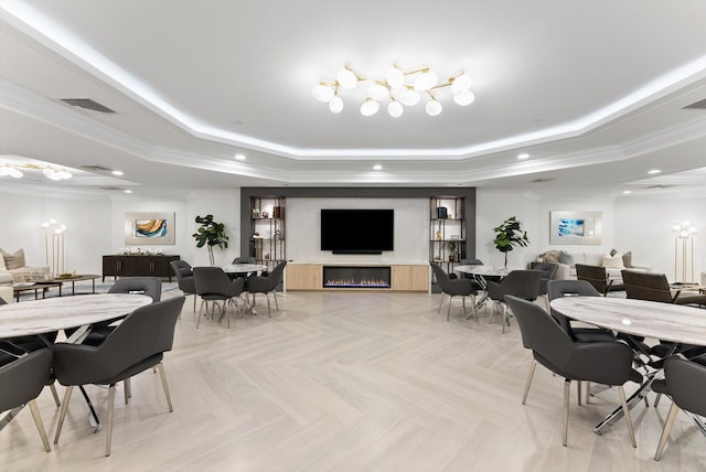 550 SE Mizner Blvd Unit B206, Boca Raton, FL 33432 - dining space with a tray ceiling, recessed lighting, a chandelier, and ornamental molding