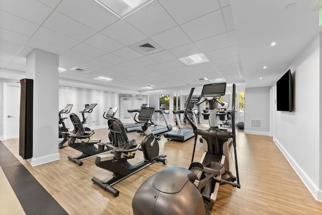 550 SE Mizner Blvd Unit B206, Boca Raton, FL 33432 - gym with light wood-style flooring, a drop ceiling, and baseboards