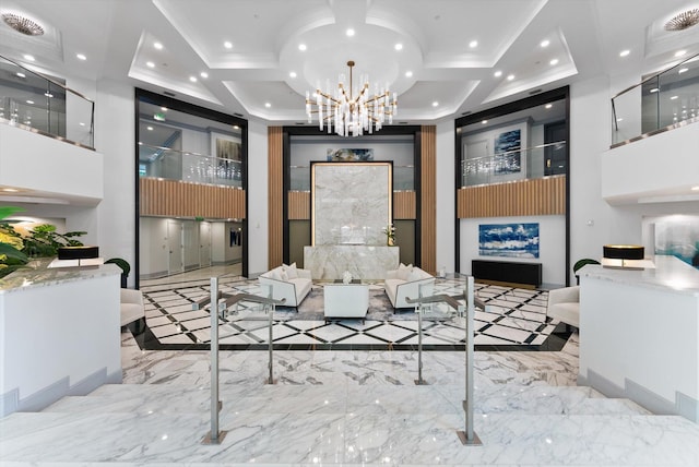 550 SE Mizner Blvd Unit B206, Boca Raton, FL 33432 - common area with a towering ceiling, recessed lighting, and ornamental molding