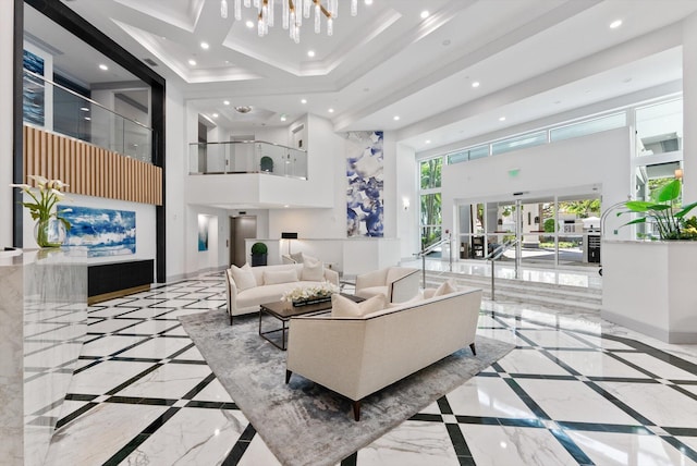 550 SE Mizner Blvd Unit B206, Boca Raton, FL 33432 - building lobby featuring a towering ceiling, recessed lighting, and ornamental molding
