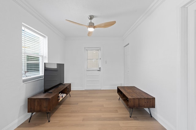 1517 NW 12th Ave, Fort Lauderdale, FL 33311 - sitting room with light wood-style floors, a ceiling fan, crown molding, and baseboards
