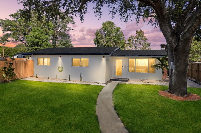 1517 NW 12th Ave, Fort Lauderdale, FL 33311 - view of front of house featuring stucco siding and a shingled roof