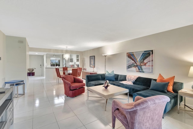 5876 Regal Glen Dr Unit 103, Boynton Beach, FL 33437 - living area featuring light tile patterned flooring and a chandelier
