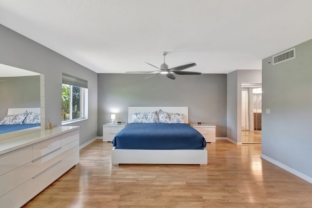 5876 Regal Glen Dr Unit 103, Boynton Beach, FL 33437 - bedroom featuring light wood finished floors, baseboards, and ceiling fan
