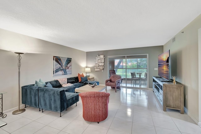 5876 Regal Glen Dr Unit 103, Boynton Beach, FL 33437 - living room featuring baseboards and light tile patterned floors