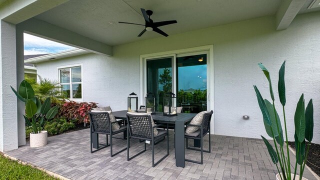1169 SE Crosswood Way, Port Saint Lucie, FL 34984 - view of patio with ceiling fan and outdoor dining area