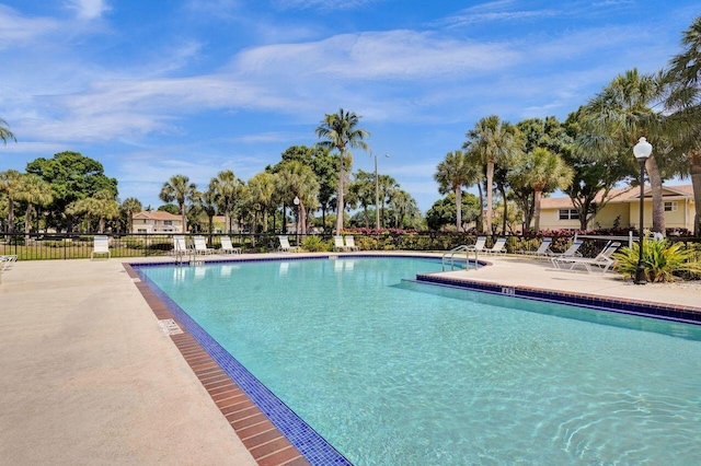 8155 Chelsea Ct Unit 55A, West Palm Beach, FL 33406 - community pool featuring a patio area