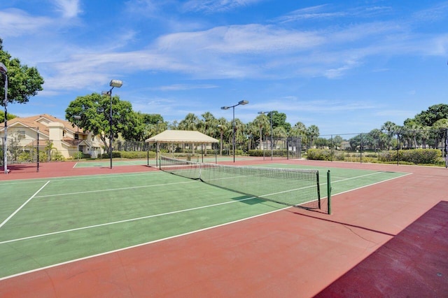 8155 Chelsea Ct Unit 55A, West Palm Beach, FL 33406 - view of tennis court with community basketball court
