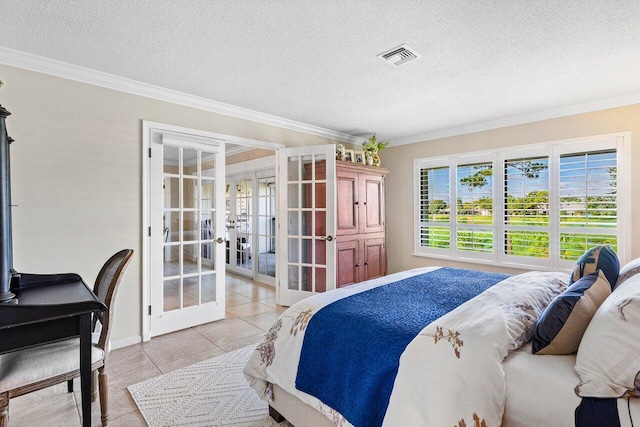 10739 Quail Covey Rd Azalea, Unit Azalea, Boynton Beach, FL 33436 - bedroom featuring french doors, ornamental molding, a textured ceiling, and light tile patterned flooring