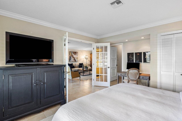 10739 Quail Covey Rd Azalea, Unit Azalea, Boynton Beach, FL 33436 - bedroom featuring ornamental molding, french doors, light tile patterned floors, and a closet