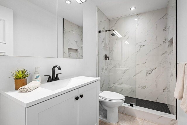 10739 Quail Covey Rd Azalea, Unit Azalea, Boynton Beach, FL 33436 - bathroom with toilet, a marble finish shower, vanity, and recessed lighting