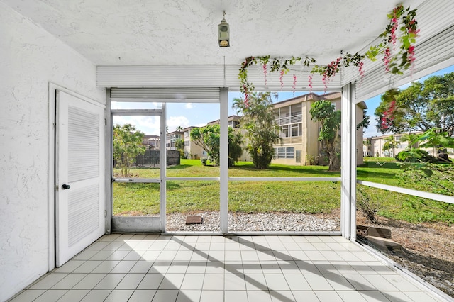 719 Lori Dr Unit 102, Palm Springs, FL 33461 - unfurnished sunroom with plenty of natural light