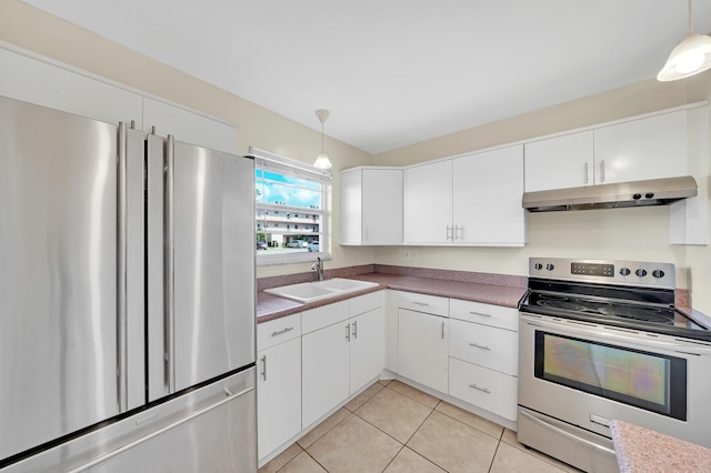 719 Lori Dr Unit 102, Palm Springs, FL 33461 - kitchen with stainless steel appliances, a sink, under cabinet range hood, white cabinets, and light tile patterned floors