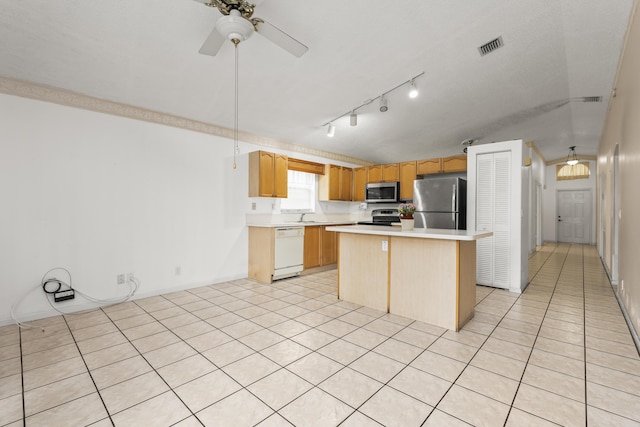 5618 Kingsmill Ct, Greenacres, FL 33463 - kitchen featuring stainless steel appliances, light countertops, a kitchen island, a sink, and a ceiling fan