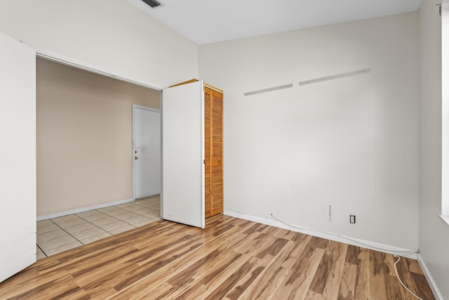 5618 Kingsmill Ct, Greenacres, FL 33463 - empty room with wood finished floors and baseboards