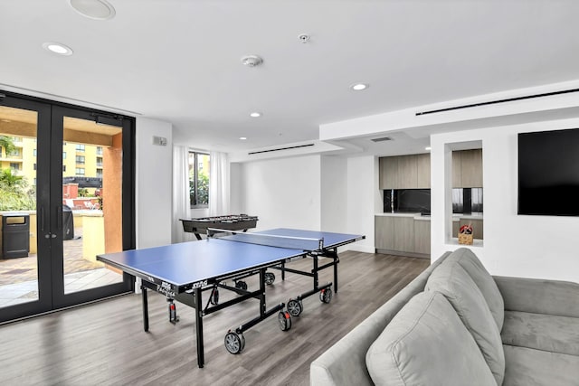 100 N Federal Hwy Unit 1004, Fort Lauderdale, FL 33301 - playroom with french doors, light wood finished floors, and recessed lighting