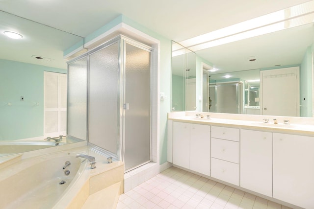 3300 S Ocean Blvd Unit 101S, Palm Beach, FL 33480 - bathroom featuring a shower stall, double vanity, a whirlpool tub, and tile patterned flooring