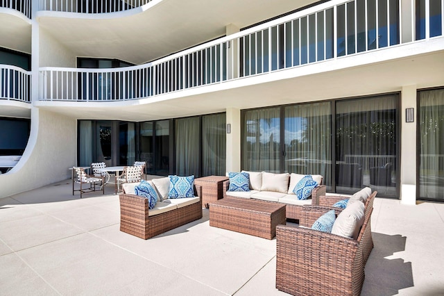 3300 S Ocean Blvd Unit 101S, Palm Beach, FL 33480 - view of patio / terrace with an outdoor hangout area, a balcony, and outdoor dining space