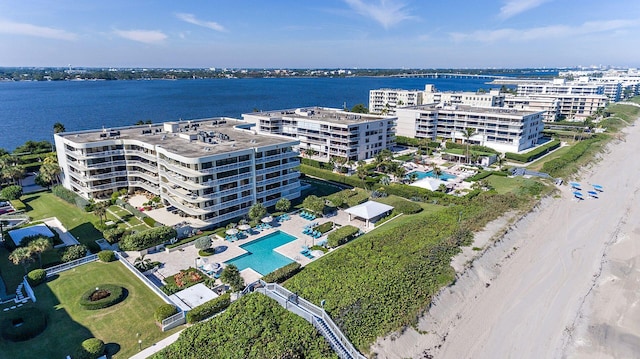 3300 S Ocean Blvd Unit 101S, Palm Beach, FL 33480 - drone / aerial view of a pool area, apartment complex, and a large body of water