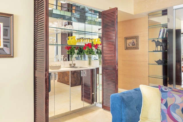 3300 S Ocean Blvd Unit 101S, Palm Beach, FL 33480 - indoor wet bar with light tile patterned floors
