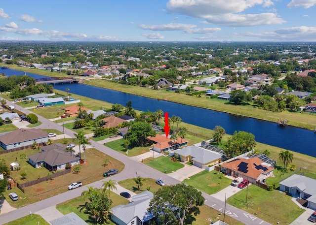 1165 SW Abingdon Ave, Port Saint Lucie, FL 34953 - aerial view of residential area with a nearby body of water