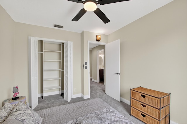 2703 Maplewood Dr, Greenacres, FL 33415 - bedroom with carpet flooring, baseboards, ceiling fan, and a closet