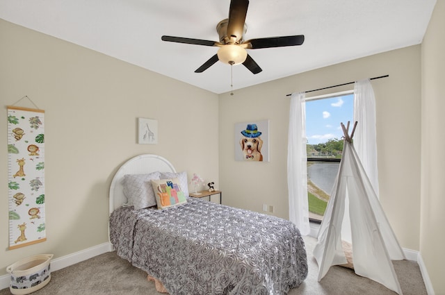 2703 Maplewood Dr, Greenacres, FL 33415 - carpeted bedroom with baseboards and a ceiling fan