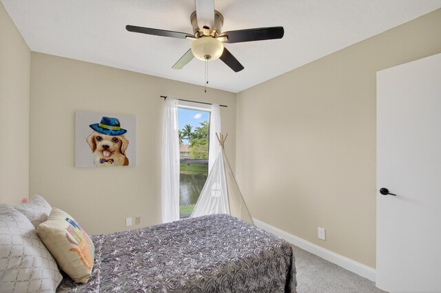 2703 Maplewood Dr, Greenacres, FL 33415 - bedroom featuring carpet, baseboards, and ceiling fan