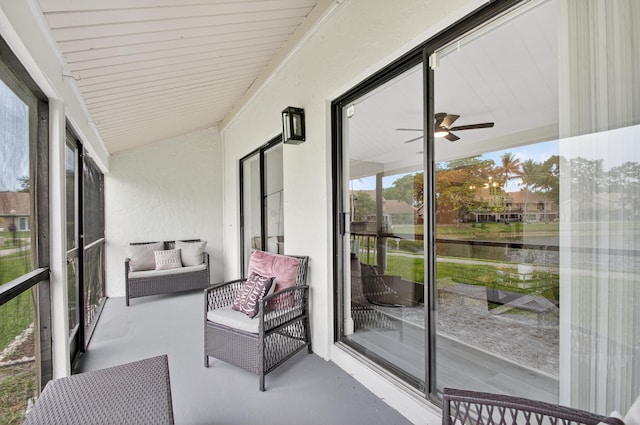 2703 Maplewood Dr, Greenacres, FL 33415 - sunroom / solarium featuring ceiling fan, vaulted ceiling, and a water view