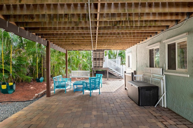 1809 Surfside Dr, Fort Pierce, FL 34949 - view of patio / terrace featuring stairs and outdoor lounge area
