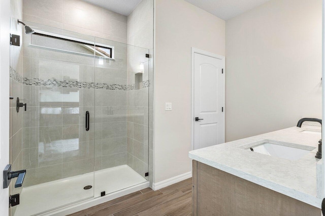 4858 Blistering Way, Lake Worth, FL 33467 - full bath with a stall shower, vanity, wood finished floors, and baseboards