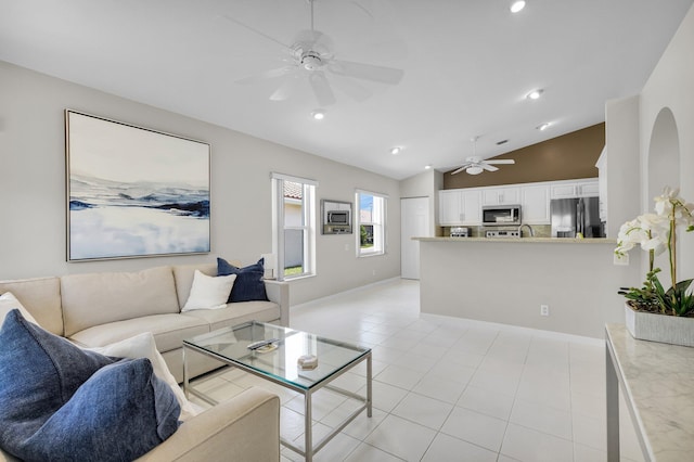 6563 Kings Creek Ter, Boynton Beach, FL 33437 - living area featuring ceiling fan, lofted ceiling, light tile patterned floors, recessed lighting, and baseboards