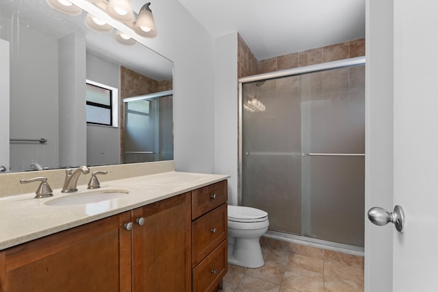453 NE 38th St, Boca Raton, FL 33431 - bathroom with vanity, toilet, a shower stall, and tile patterned flooring