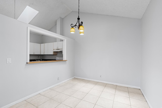 453 NE 38th St, Boca Raton, FL 33431 - unfurnished dining area with a chandelier, a sink, high vaulted ceiling, baseboards, and light tile patterned floors