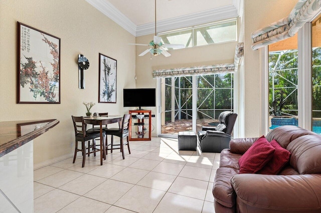 1345 SW 21st Ave, Boca Raton, FL 33486 - tiled living area featuring crown molding, plenty of natural light, a ceiling fan, and baseboards