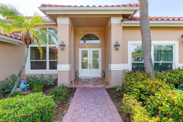 1345 SW 21st Ave, Boca Raton, FL 33486 - property entrance featuring stucco siding and a tiled roof