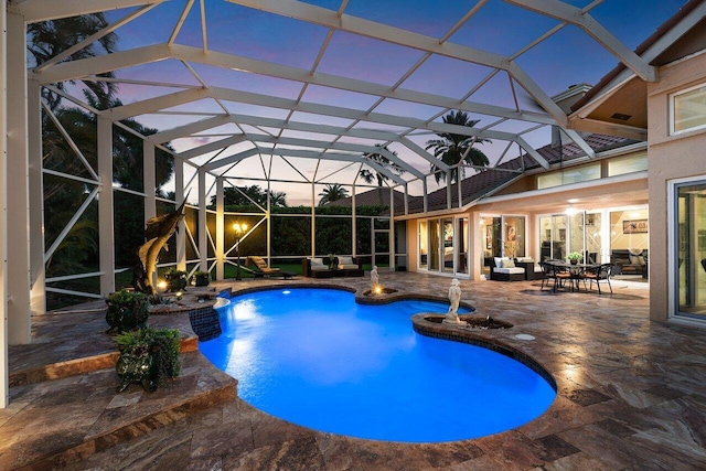 1345 SW 21st Ave, Boca Raton, FL 33486 - view of swimming pool with an outdoor living space with a fire pit, a patio area, and a pool with connected hot tub