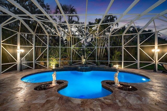 1345 SW 21st Ave, Boca Raton, FL 33486 - pool at dusk with an outdoor pool, a patio area, and a lanai