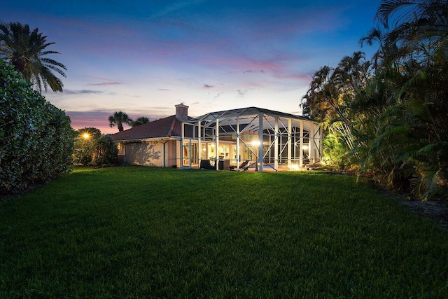 1345 SW 21st Ave, Boca Raton, FL 33486 - back of property with a yard, a lanai, and a chimney