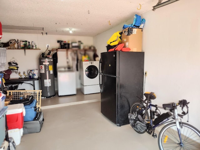 1514 SE Manth Ln, Port Saint Lucie, FL 34983 - garage with washer / clothes dryer, electric water heater, and freestanding refrigerator