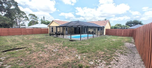 1514 SE Manth Ln, Port Saint Lucie, FL 34983 - rear view of property featuring a patio and a lanai