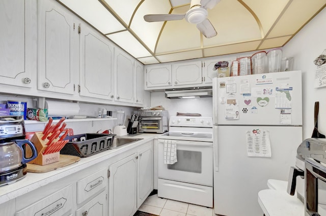 210 Chatham K, West Palm Beach, FL 33417 - kitchen with white appliances, under cabinet range hood, light countertops, and white cabinetry