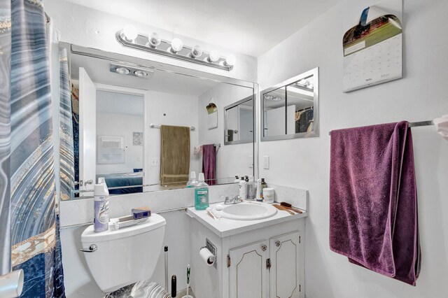 210 Chatham K, West Palm Beach, FL 33417 - bathroom with toilet and vanity