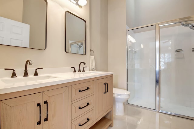 9308 Swansea Ln, West Palm Beach, FL 33411 - bathroom featuring a stall shower, double vanity, and toilet