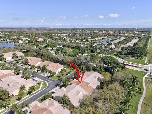 9308 Swansea Ln, West Palm Beach, FL 33411 - aerial view of property and surrounding area featuring a nearby body of water and nearby suburban area